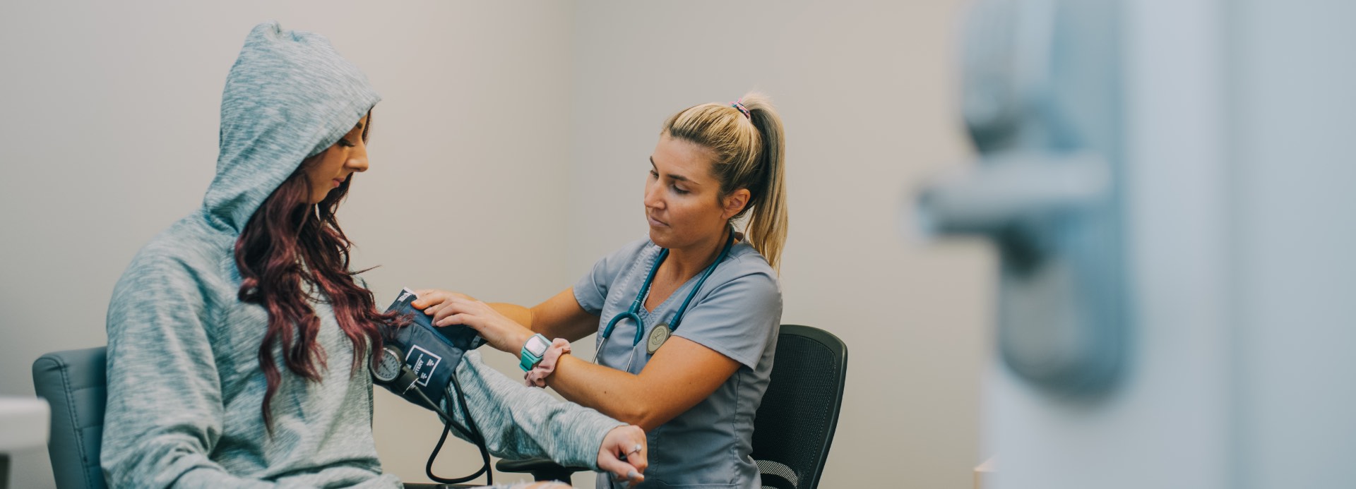 Taking Evolve Recovery Center patient blood pressure