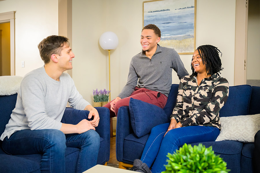 group of patients chatting in common area after under going detox for stimulants in