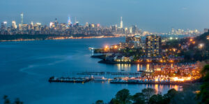 View of Fort Lee, Edgewater and New York City along the Hudson River, at nighttime