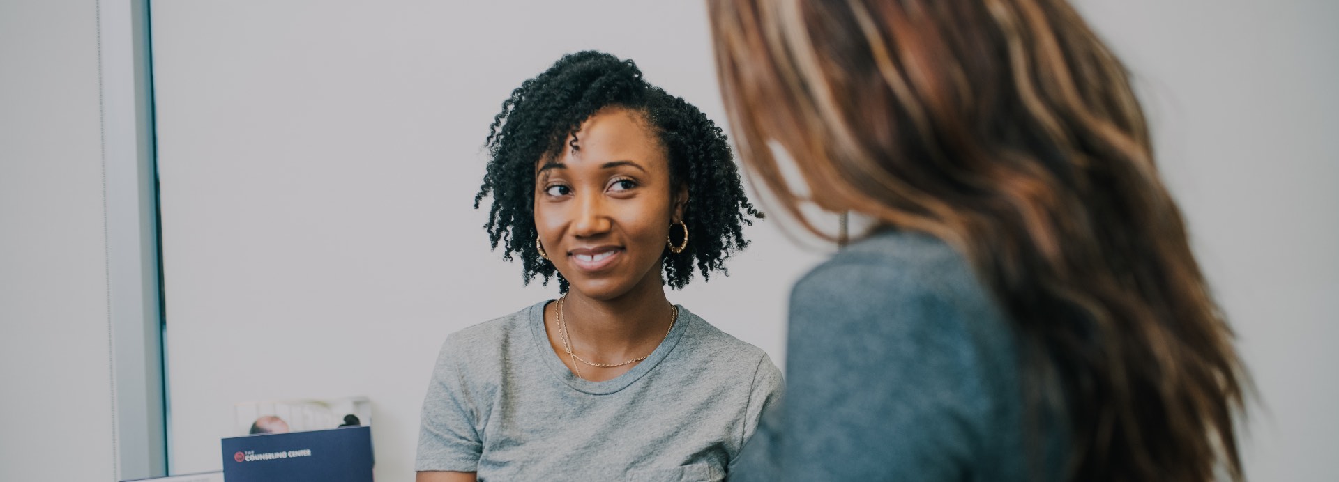 Patient talking to a counselor at an IOP session at The Counseling Center