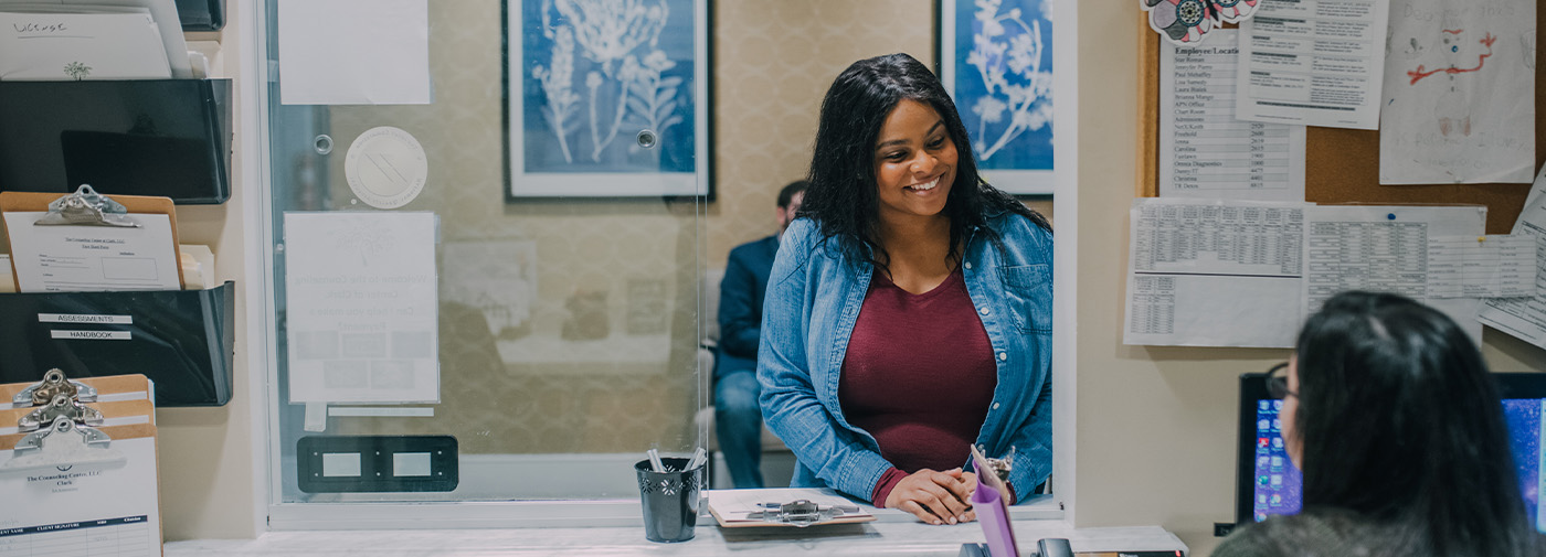 A patient at the front desk