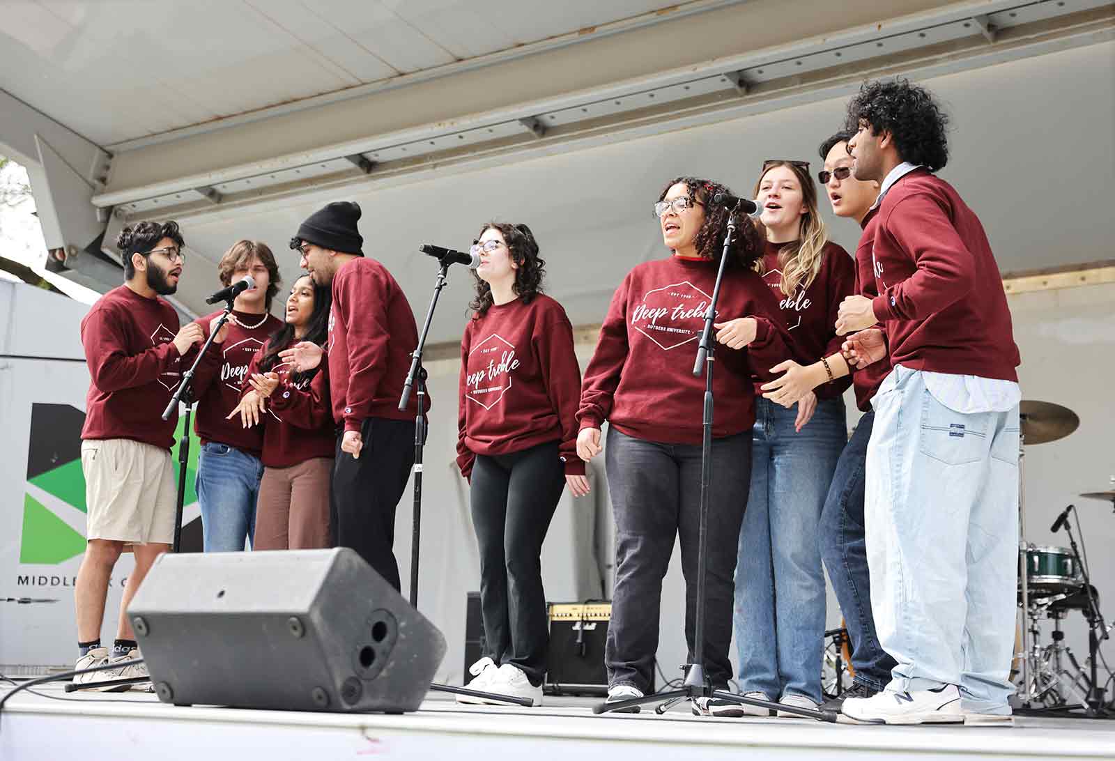 Members of the co-ed a cappella group Deep Treble perform on Voorhees Mall during Rutgers Day 2024.
