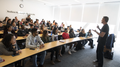 Guest speaker alum Michael Miller speaks to Assistant Professor of Professional Practice Mukesh Patel's innovations class in Business School 100 Rock on Livingston Campus
