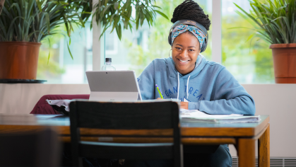 Cheyenne Smith studies in Alexander Library