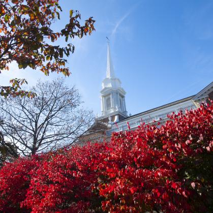Voorhees Chapel surrounded by red leaves in the fall