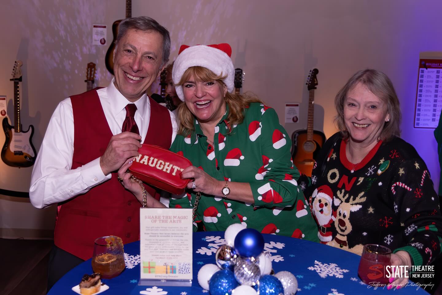 May be an image of sweater, tinsel and text