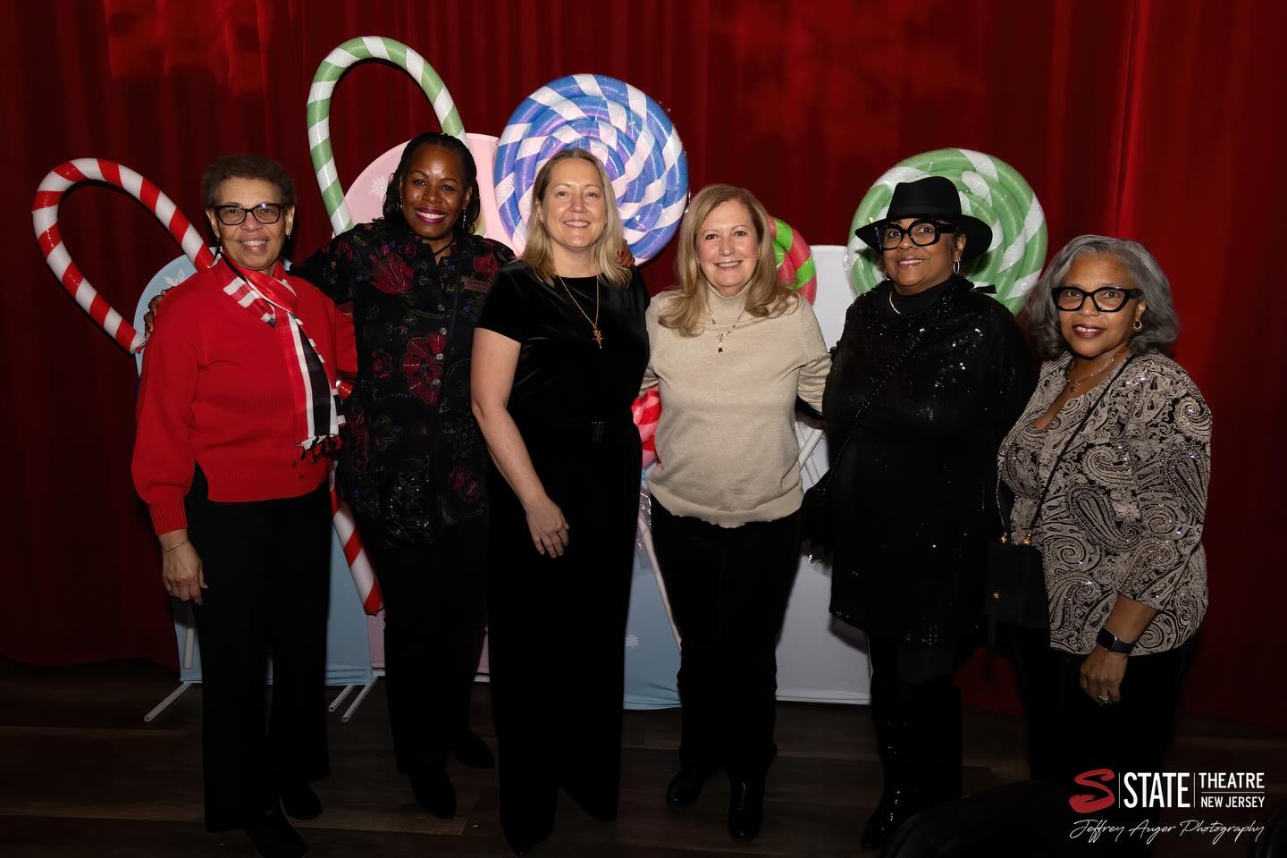 May be an image of one or more people, christmas tree, tinsel, costume, office and text