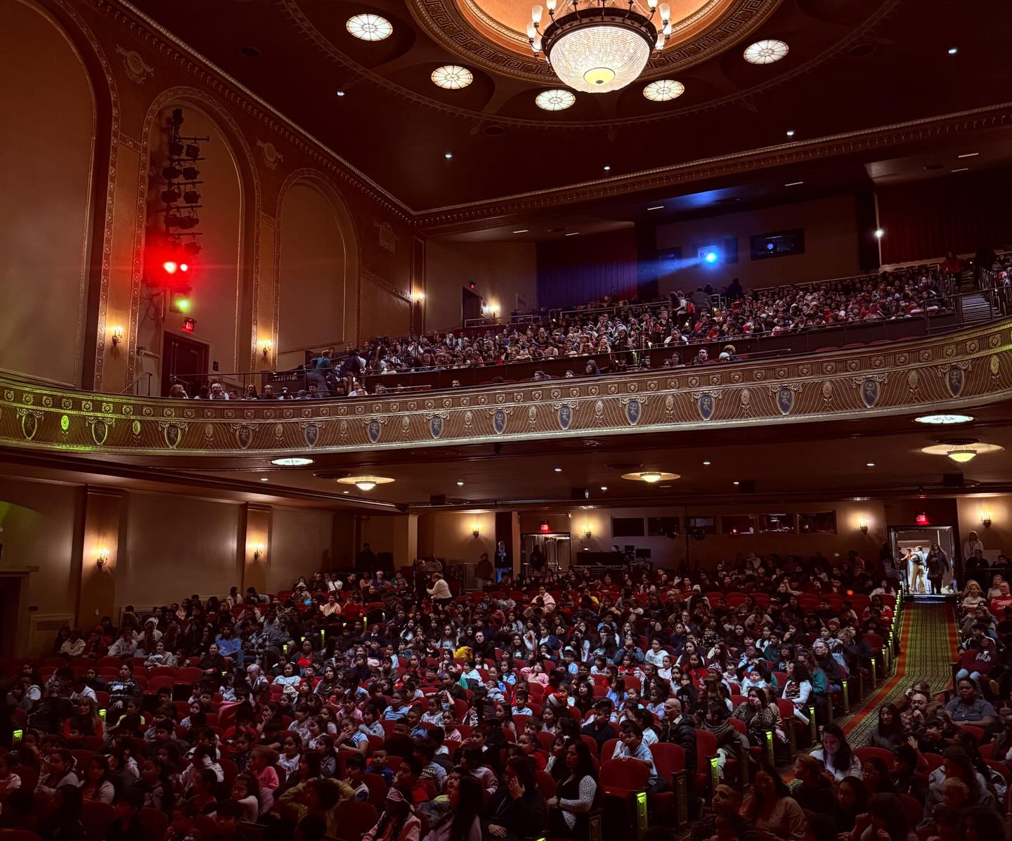 May be an image of crowd, concert and text