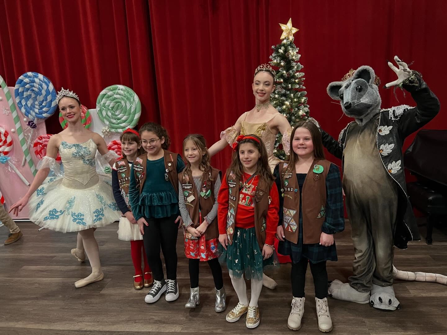 May be an image of dancing, costume, lollipop and text