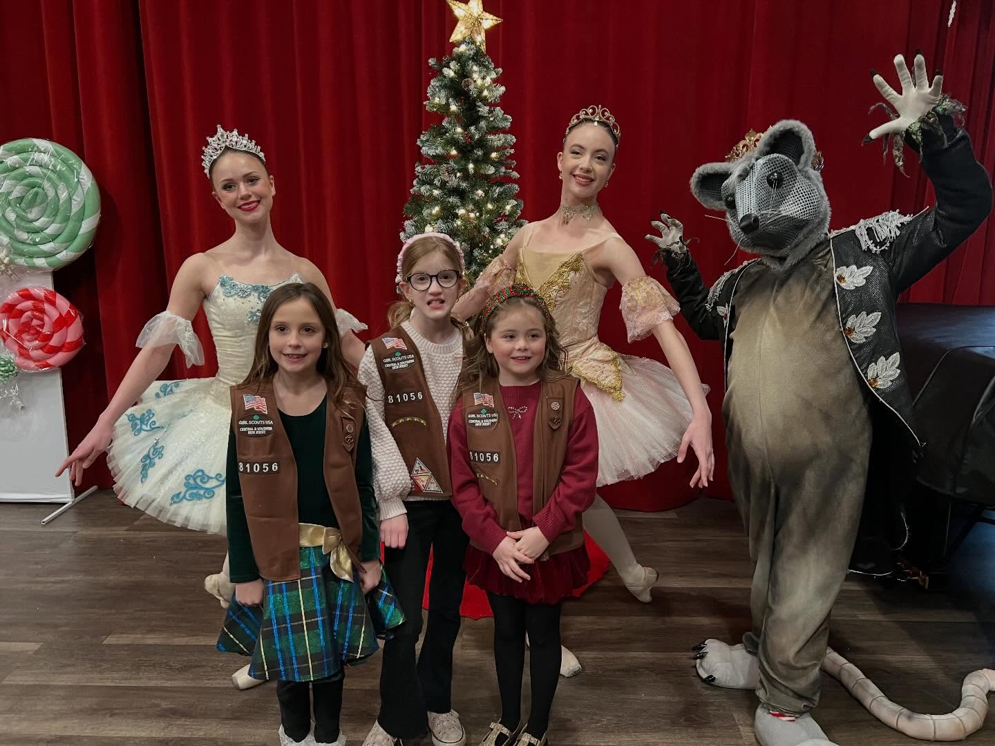 May be an image of dancing, costume and text