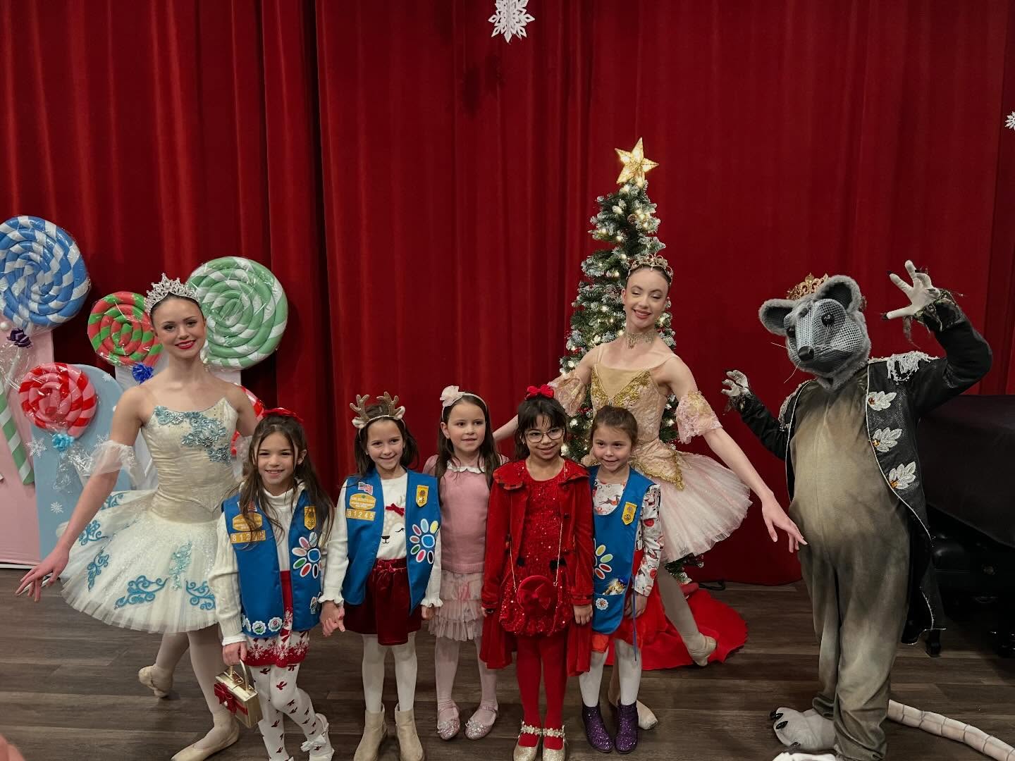 May be an image of dancing, costume, candy, snowman and text