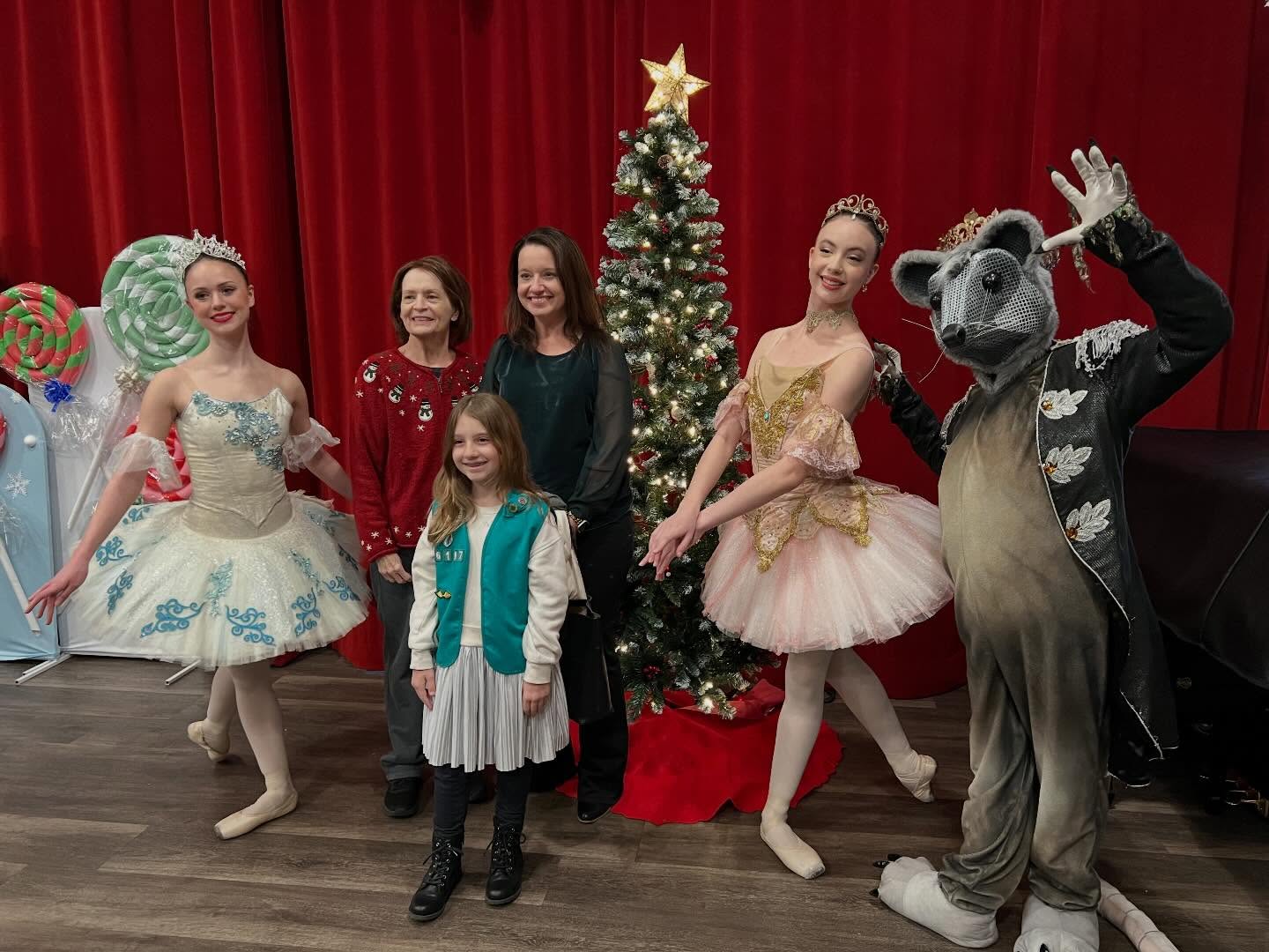 May be an image of dancing, christmas tree, costume and text