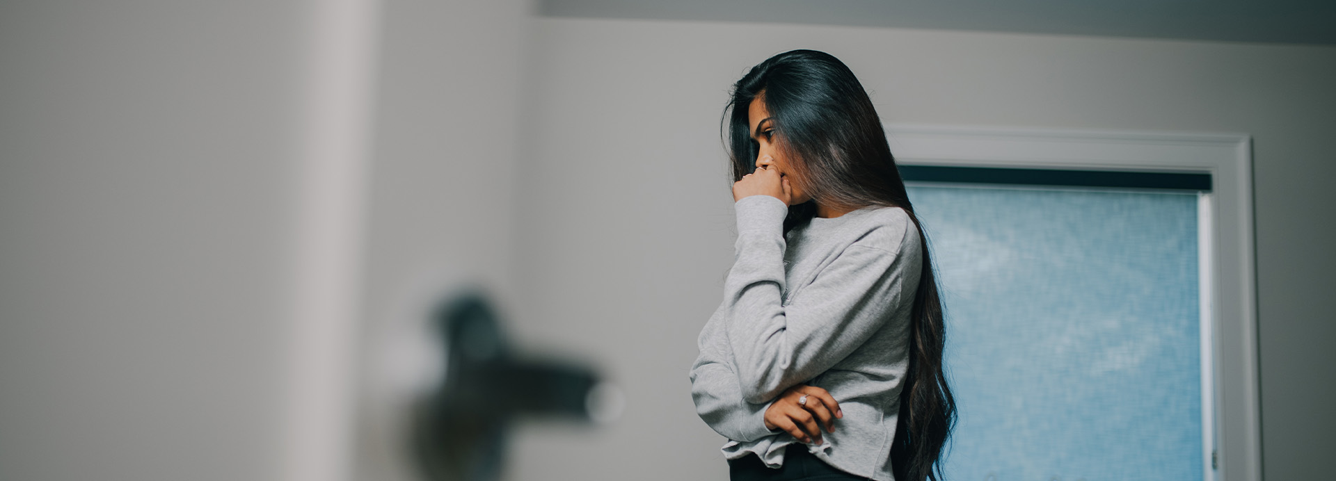 Woman person in her quarters coping with depression symptoms.