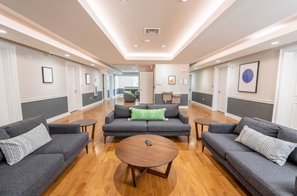 double beds in a patient room with yellow blankets