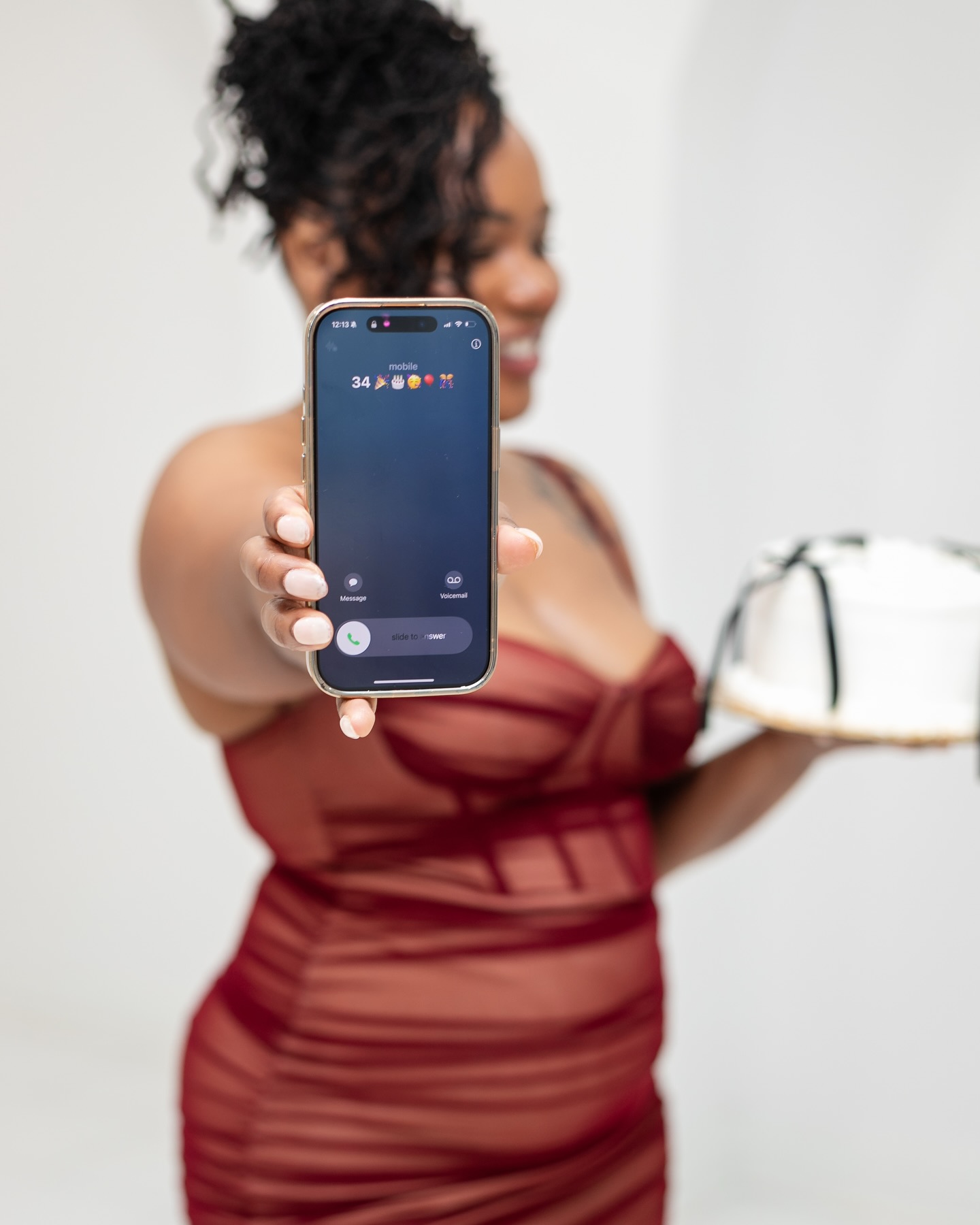 May be an image of one or more people, phone and text