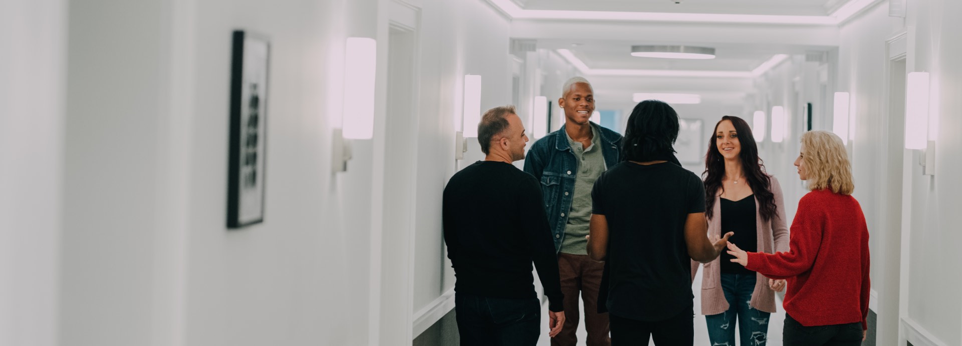 Group in hallway at Evolve Recovery Center Millbury